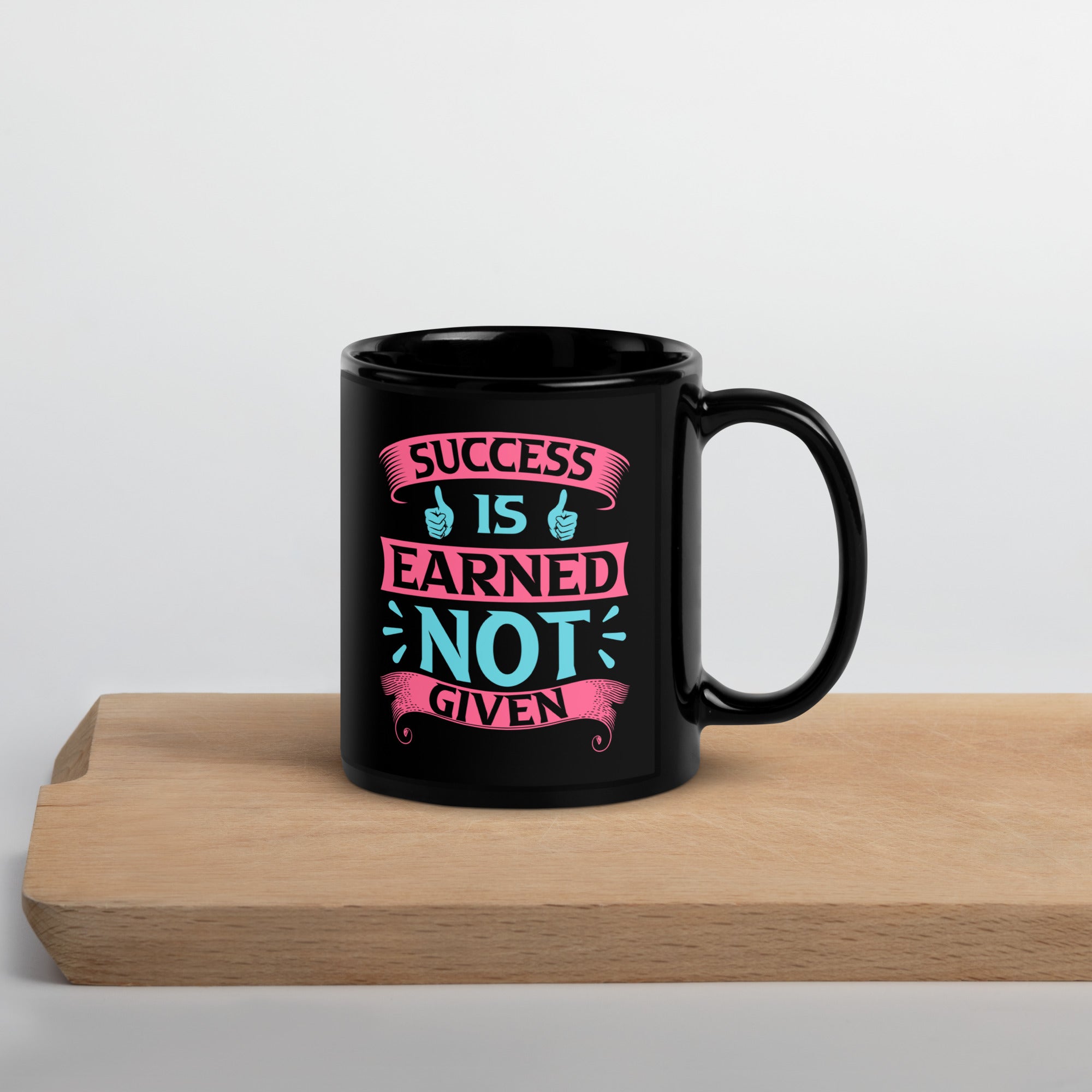 success-is-earned-not-given-black-glossy-mug